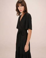 Vestido largo ajustado con volante noir Sequoia