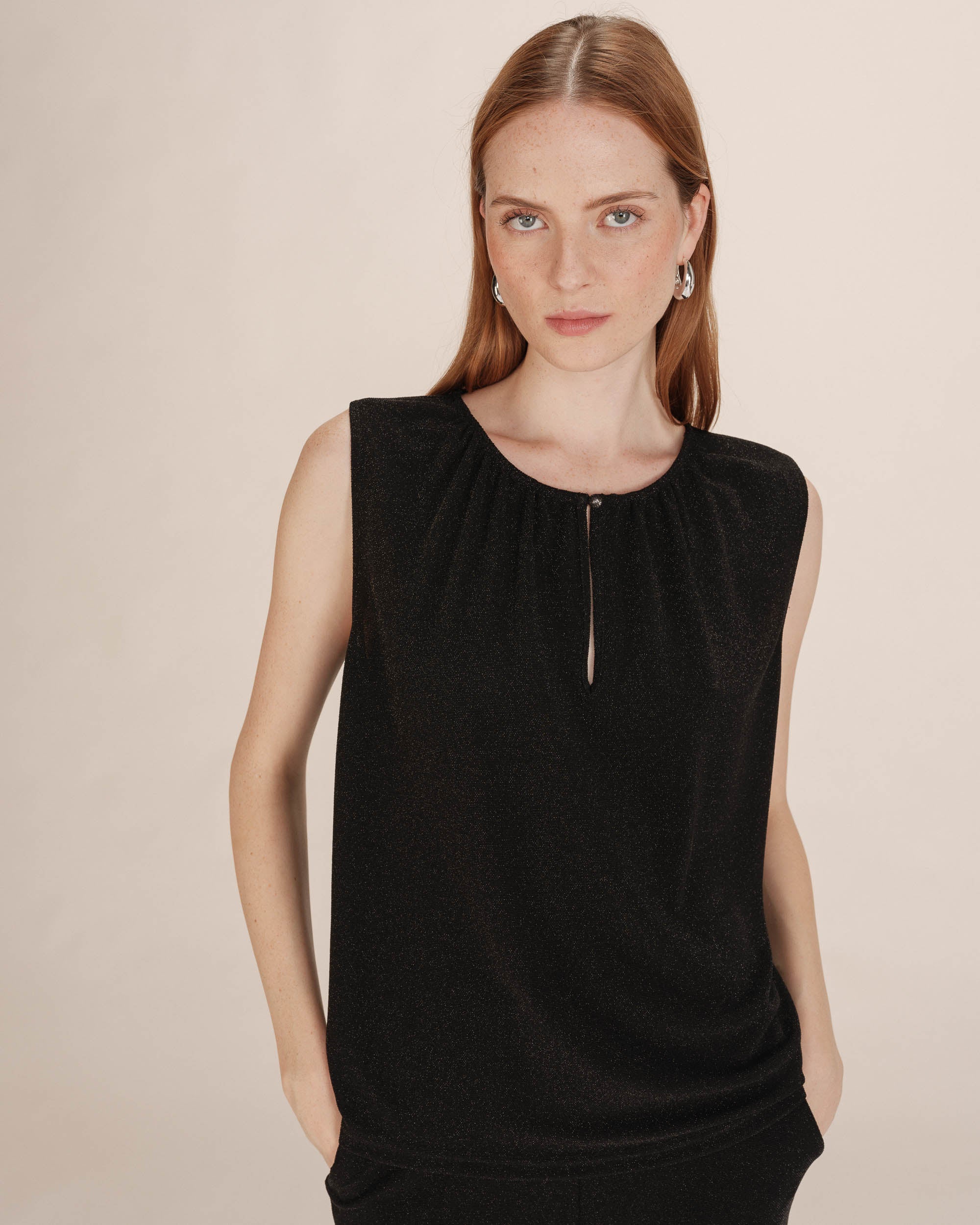 Top sans manches noir Texto