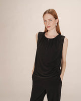 Top sans manches noir Texto