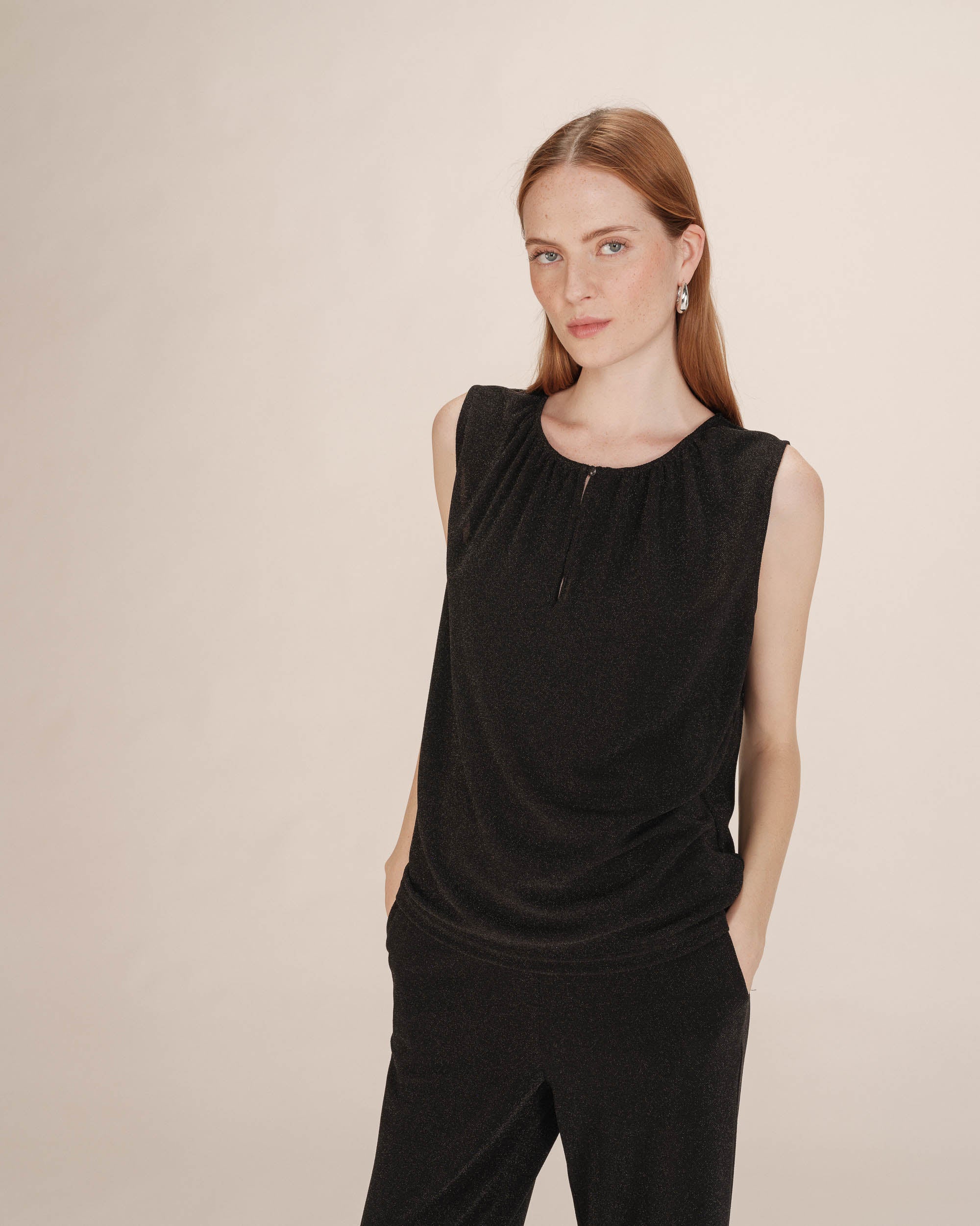 Top sans manches noir Texto