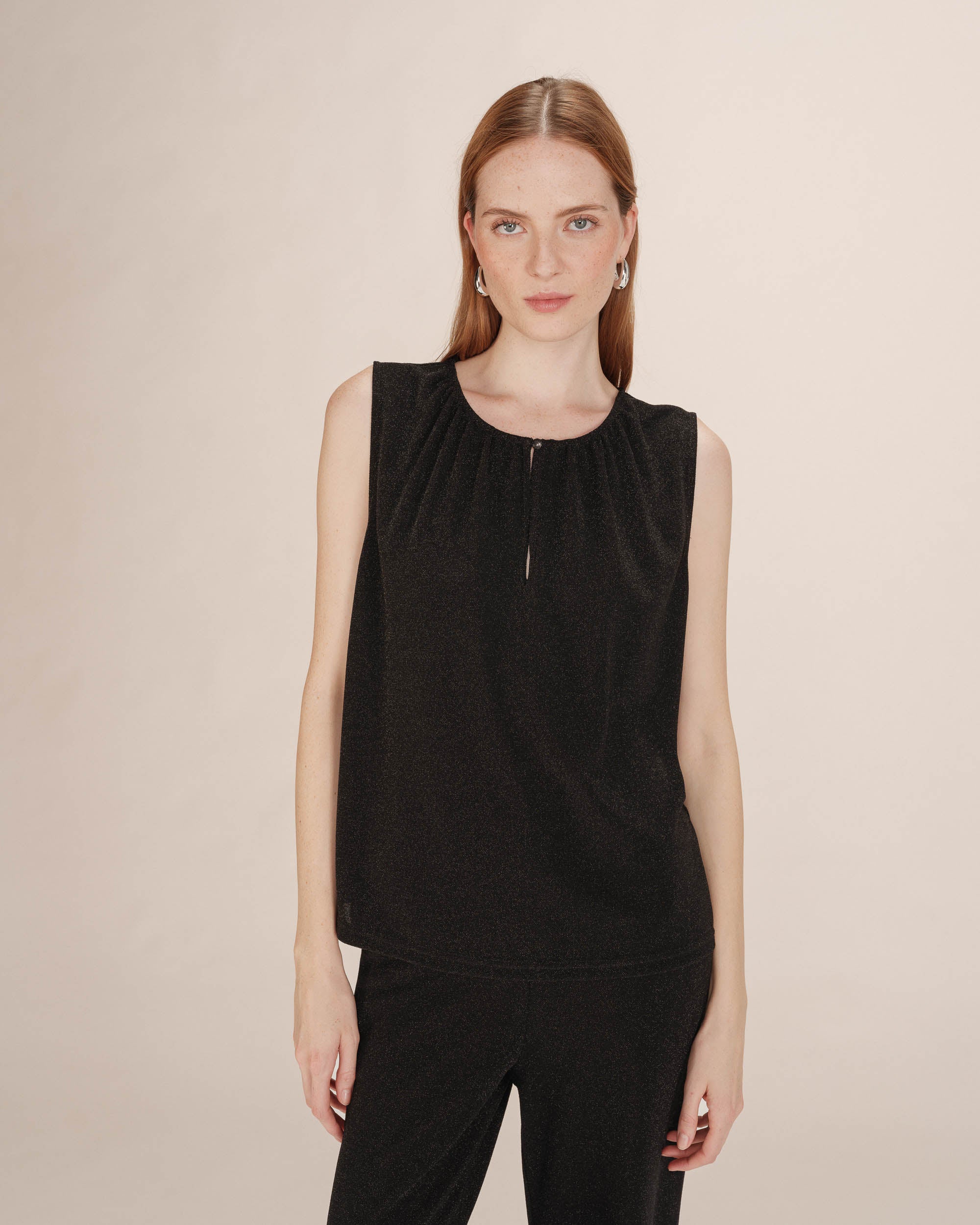 Top sans manches noir Texto