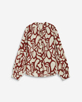 Blouse col V à imprimé géométrique terracotta Ambrine