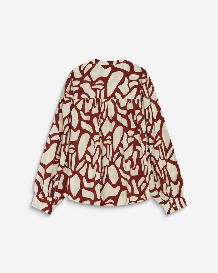 Blouse col V à imprimé géométrique terracotta Ambrine