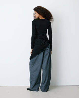 Top asymétrique manches longues bas en dentelle noir Bina