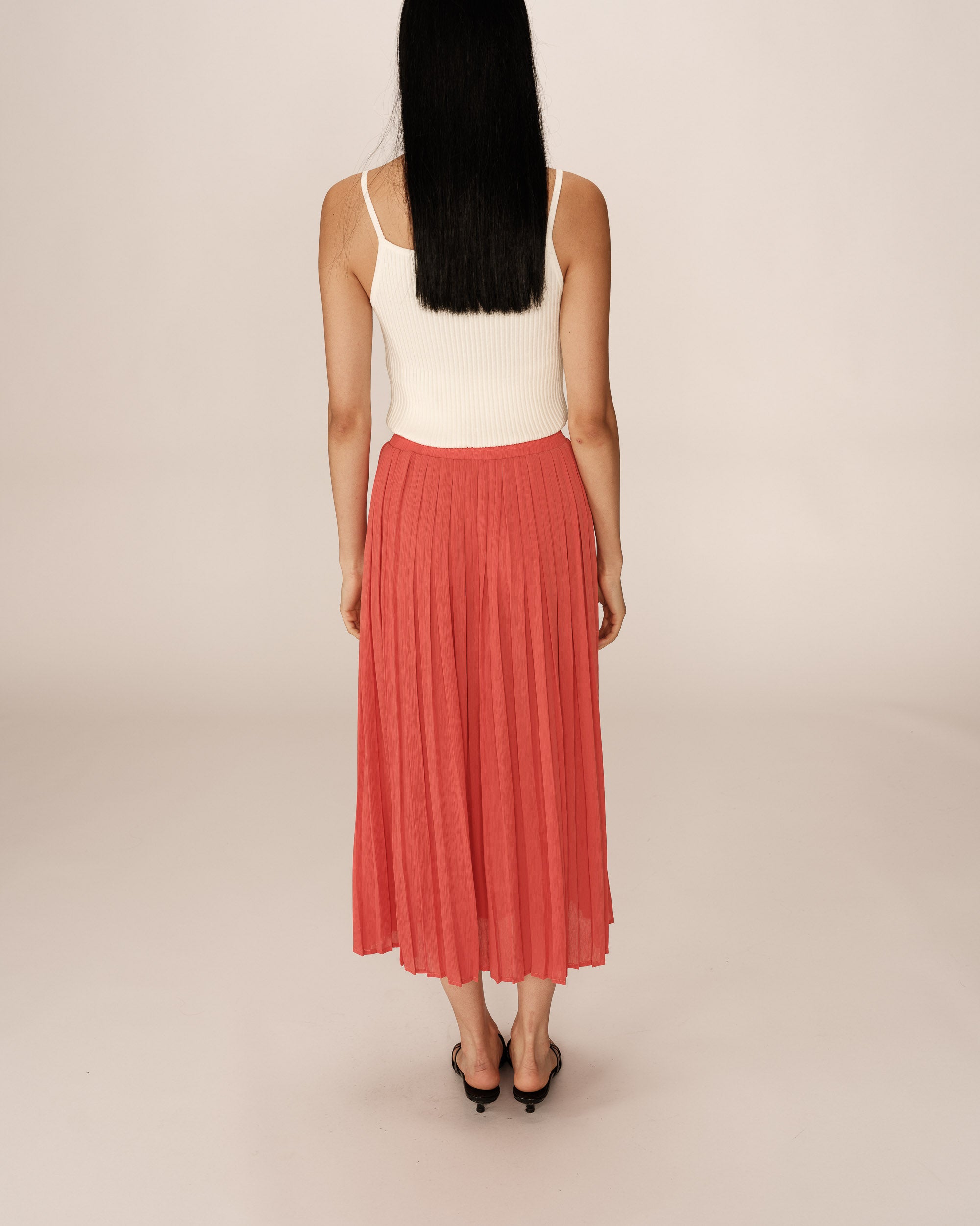 Jupe longue plissee corail Plisse