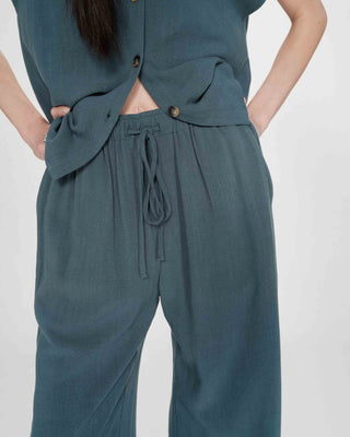 Pantalon large en lin emeraude Raven