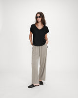 Top large en lurex noir Vaporo