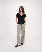 Top amplio de lurex con escote en V noir Vaporo