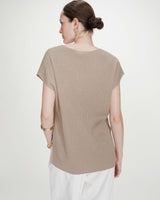 Top amplio de lurex con escote en V or Vaporo