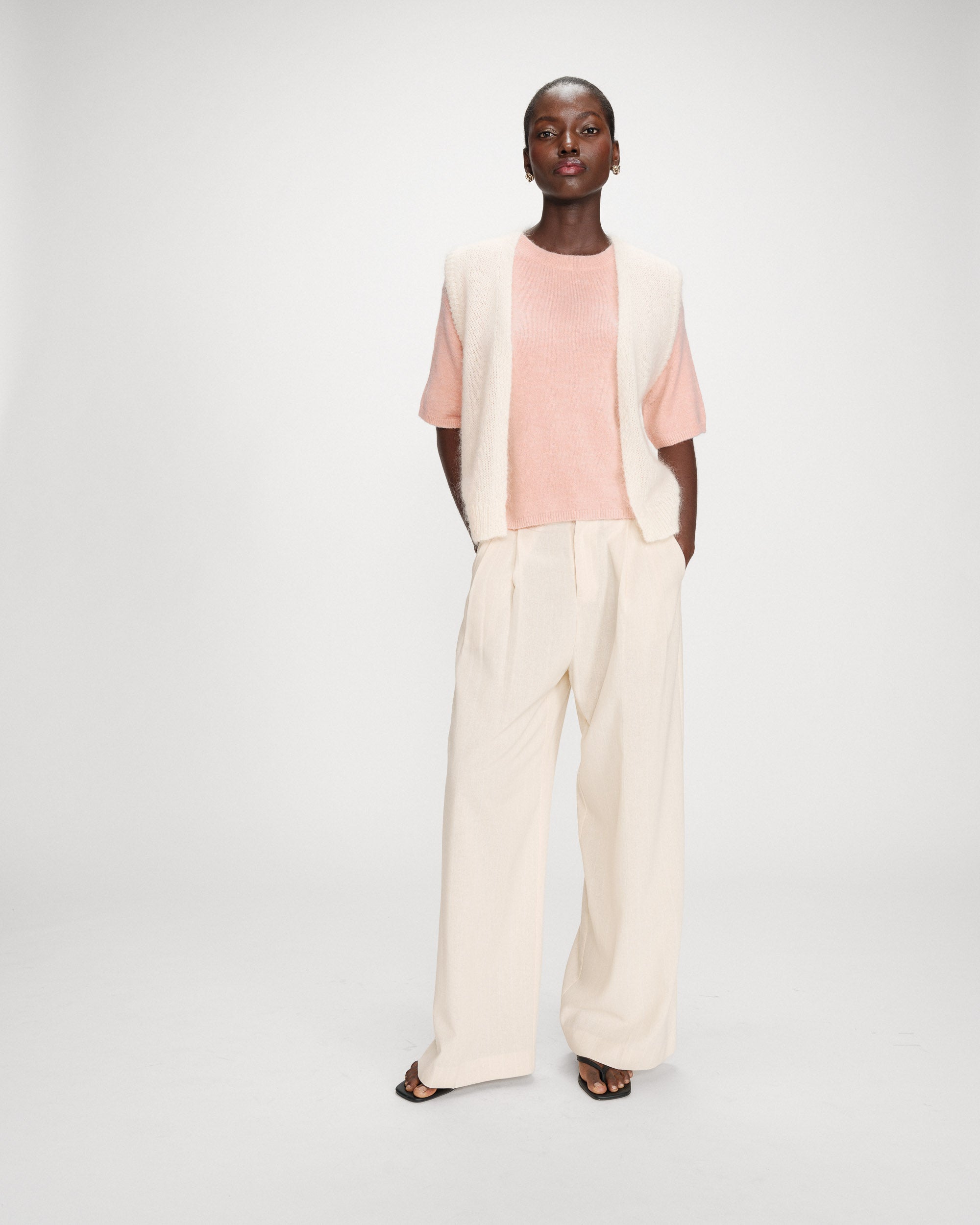 Jersey oversize de lana con cuello redondo peche Vamos