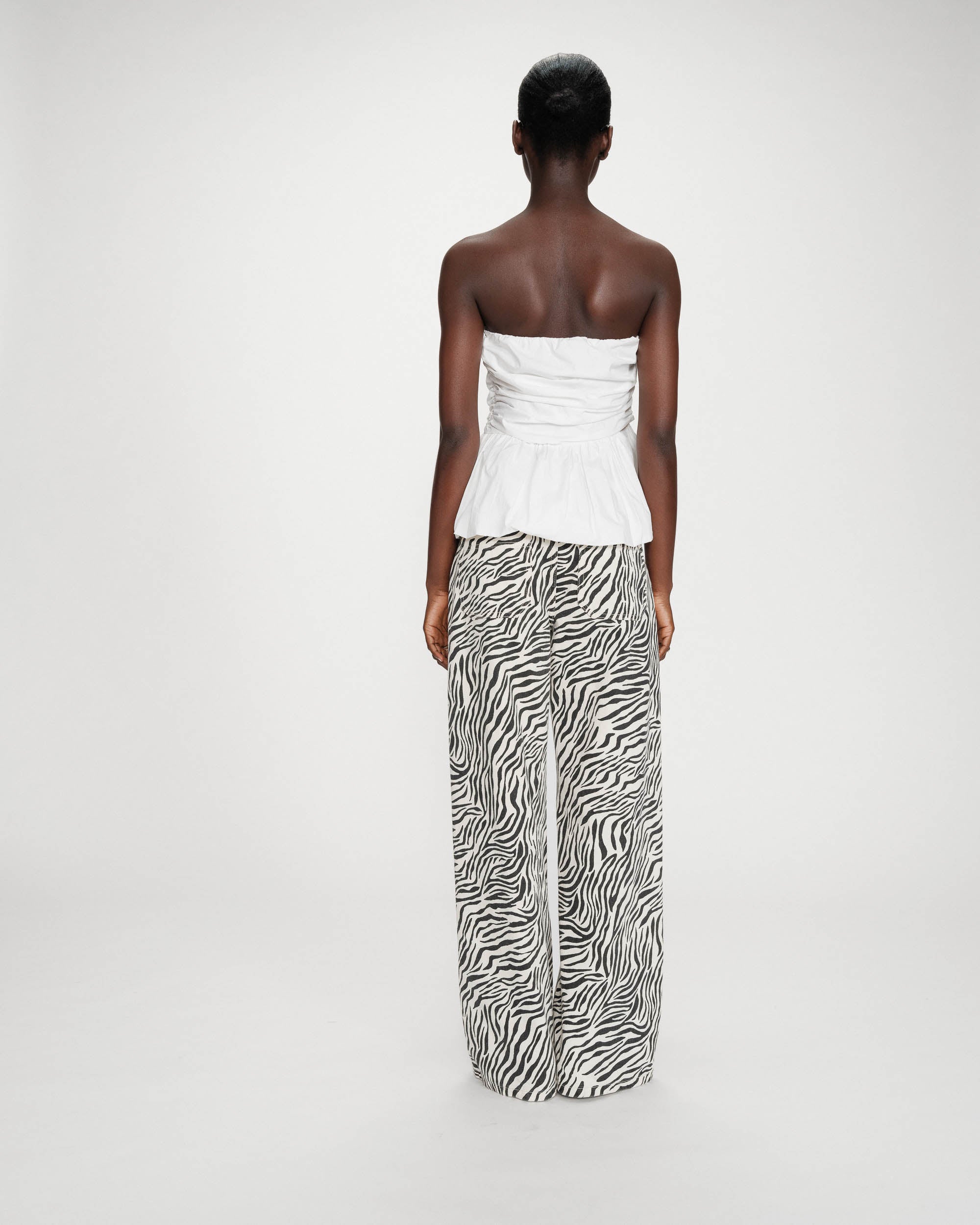 Top peplum ajustado ivoire Valo