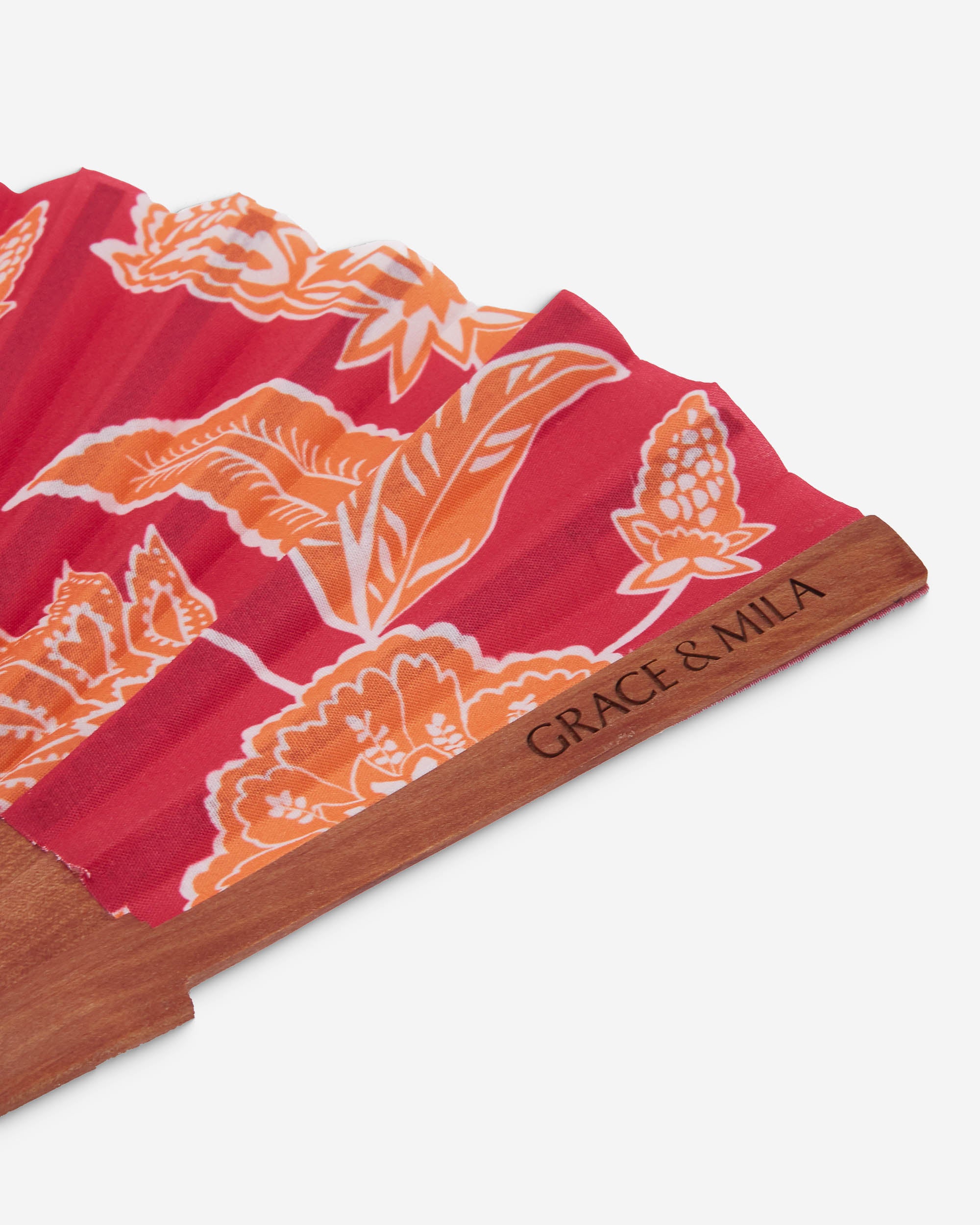 Abanico de madera y tela estampado floral fuchsia Weslyn